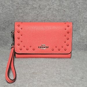 Coach Flap Phone Wallet/Wristlet With Studs in Vibrant Coral